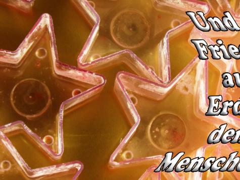 Sternenkerzen mit Text: 'Und Frieden auf Erden den Menschen!'